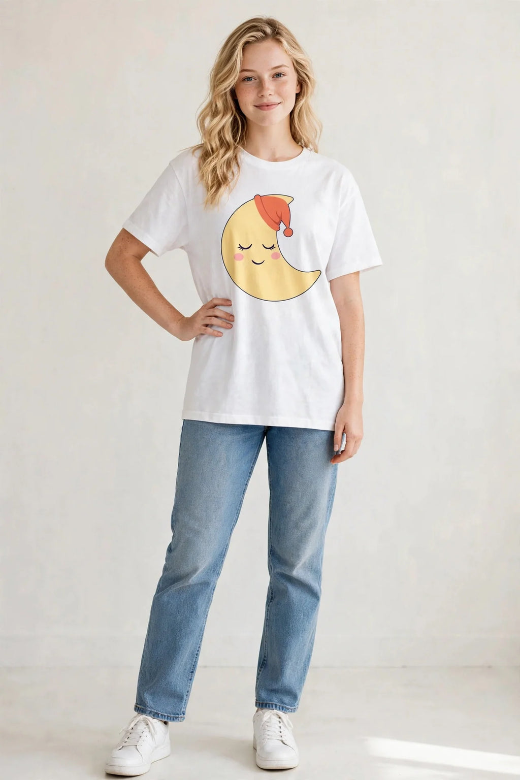 Woman wearing the Sleepy Luna kids tee — Mangrove Moon Books merch