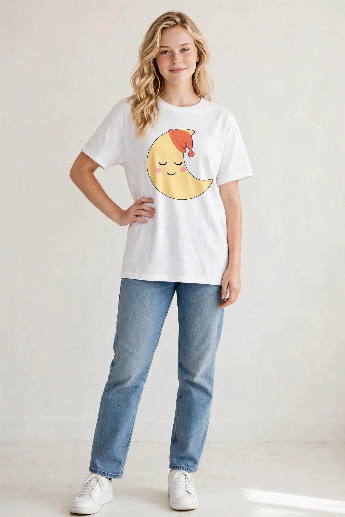 Woman wearing the Sleepy Luna kids tee — Mangrove Moon Books merch